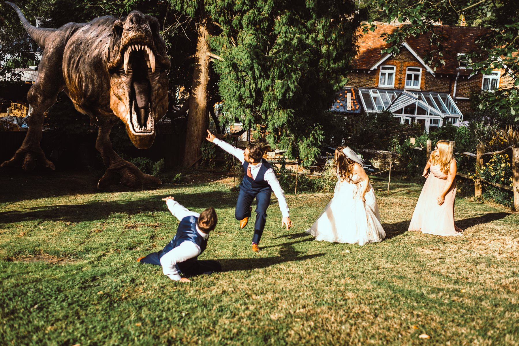 Special effects wedding photo bomb example with wedding party and dinosaur